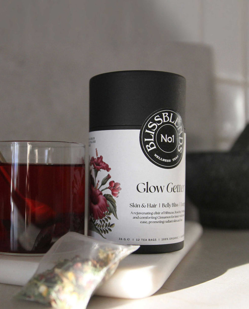 Daily gut reset and soothing tea with rosehip, hibiscus and cinnamon, formulated by BlissBlends to support glow and skin health from within. 